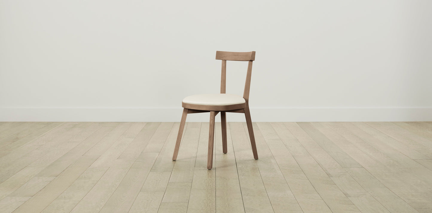 The Allen  - Pebbled Leather Swan Dining Chair